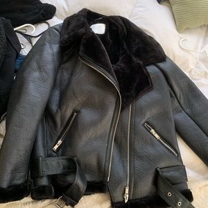 Black faux leather coat